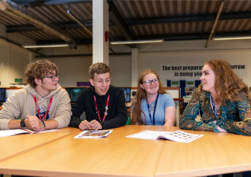 The Canterbury Academy Sixth Form Sixth form students around a table