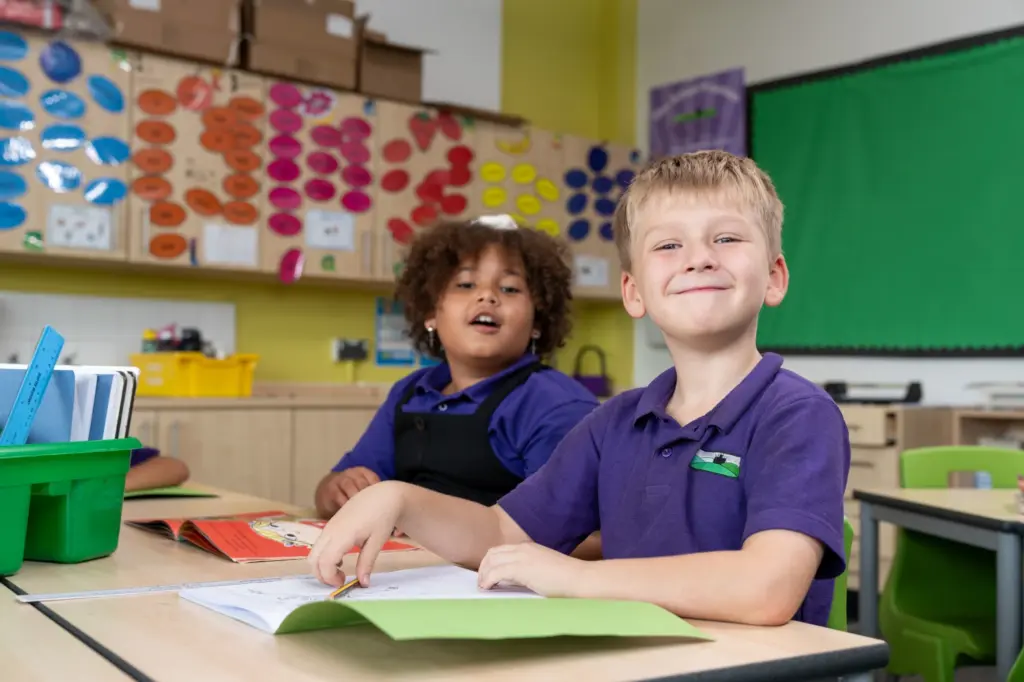Students at The Canterbury Primary School in purple uniform t-shirts